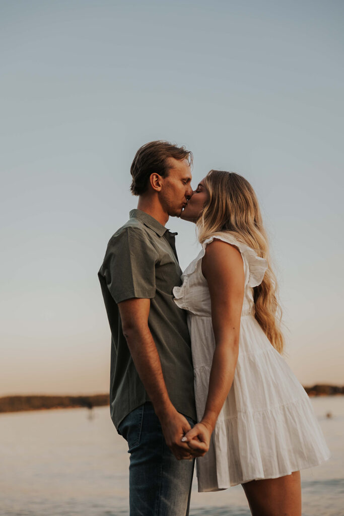 romantic engagement photo in the water