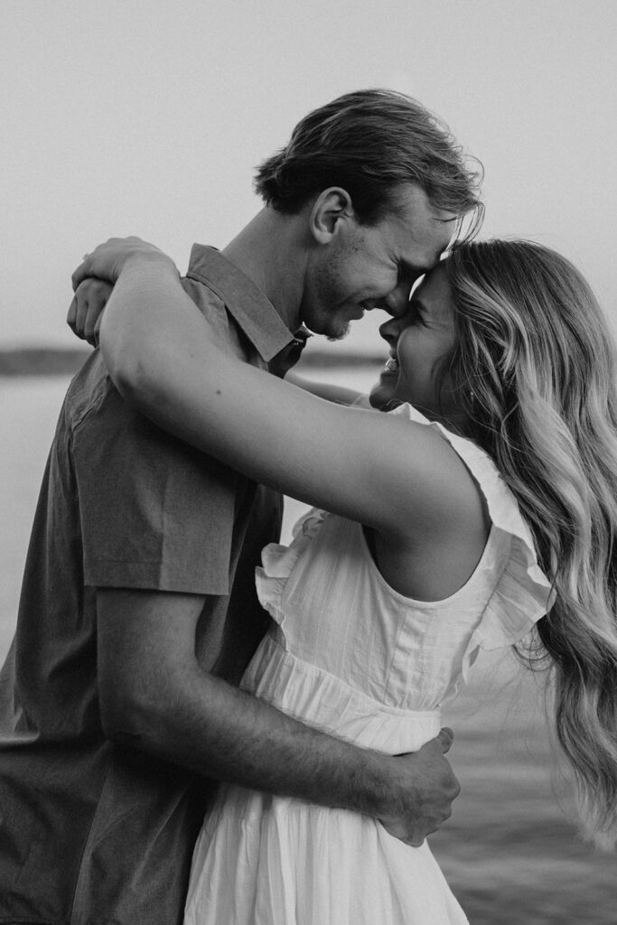 playful and romantic waterfront engagement photos in sibley state park, mn