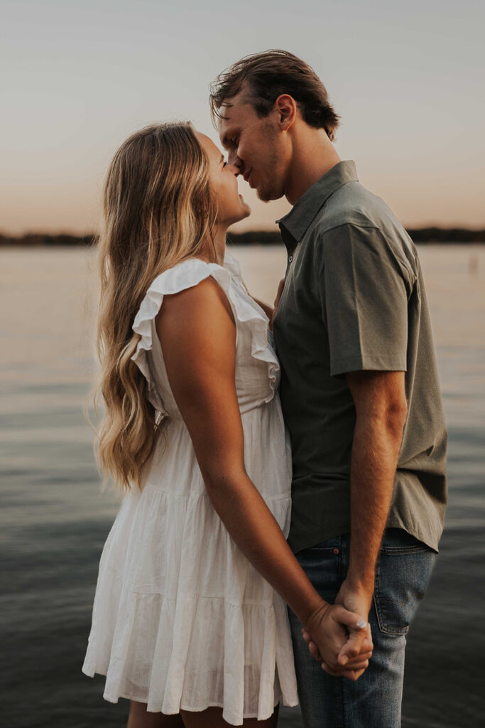 playful and romantic waterfront engagement photos in sibley state park, mn