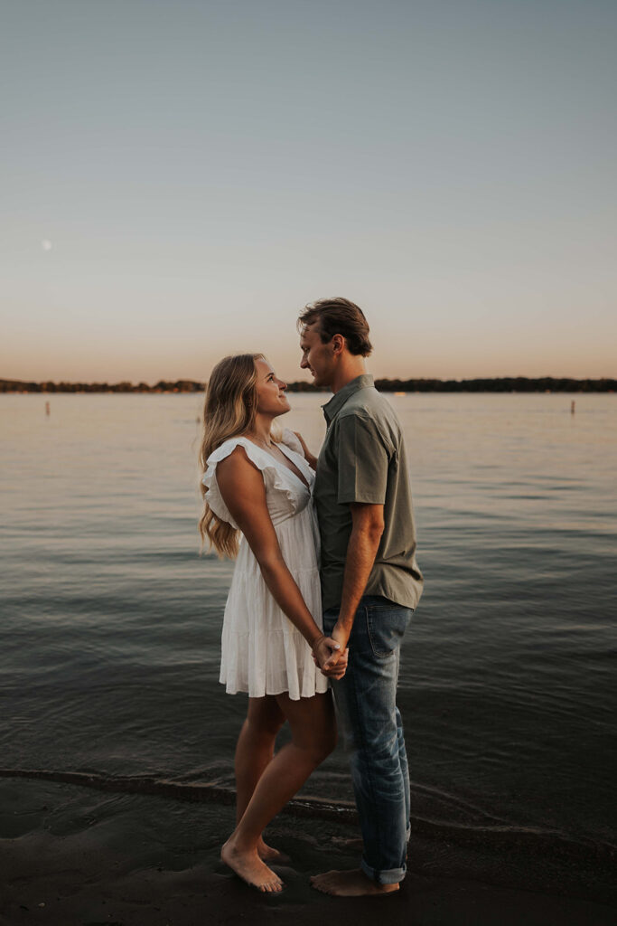 playful and romantic waterfront engagement photos in sibley state park, mn