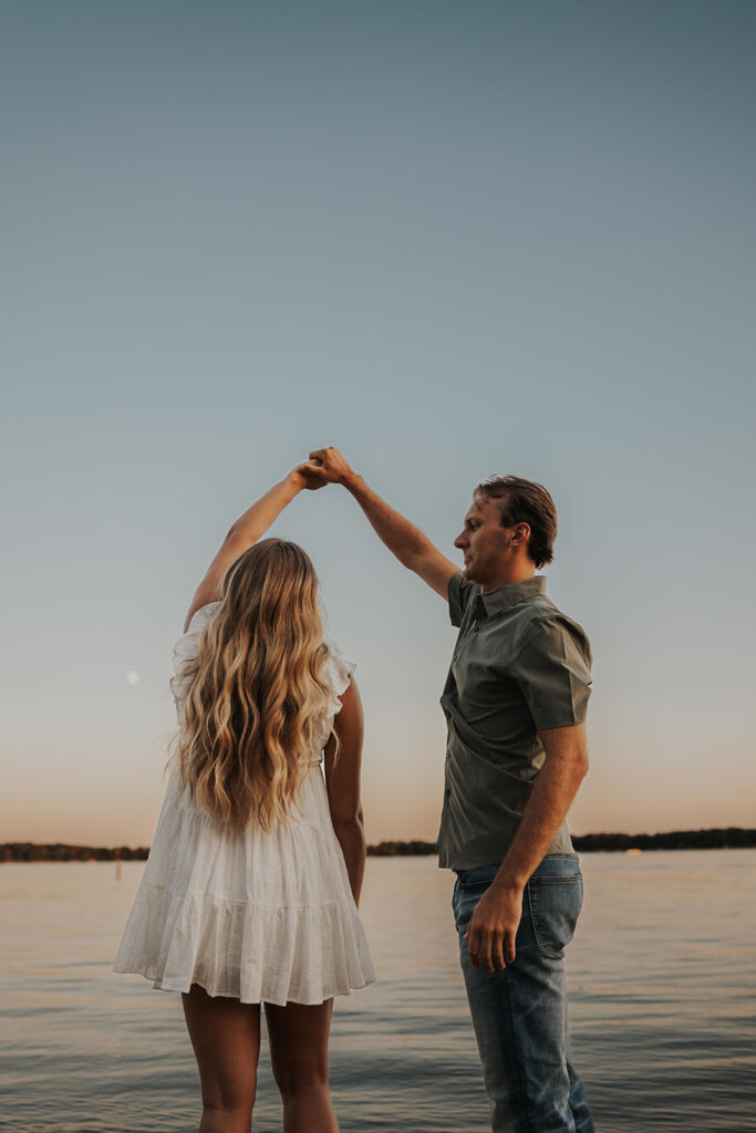 playful and romantic waterfront engagement photos in sibley state park, mn