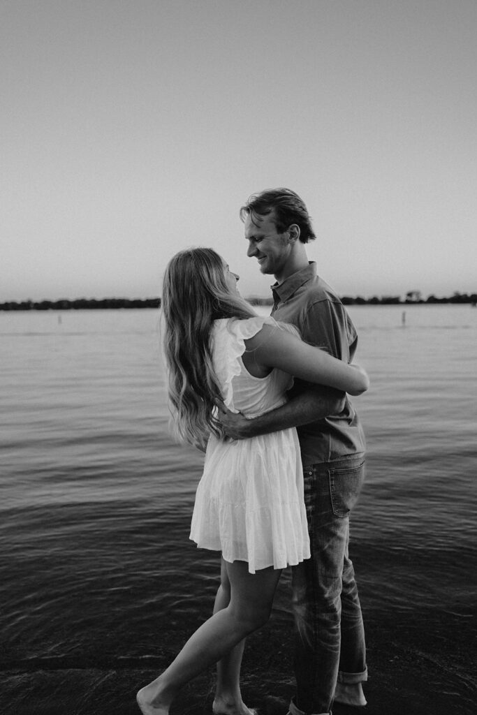 playful and romantic waterfront engagement photos in sibley state park, mn