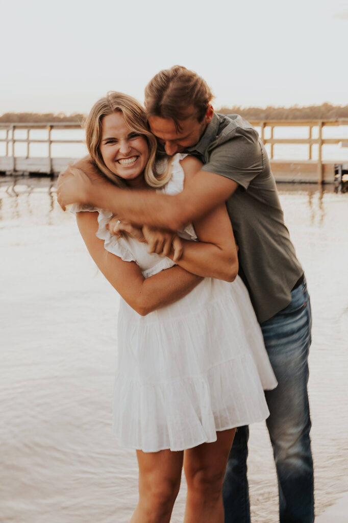 playful and romantic waterfront engagement photos in sibley state park, mn