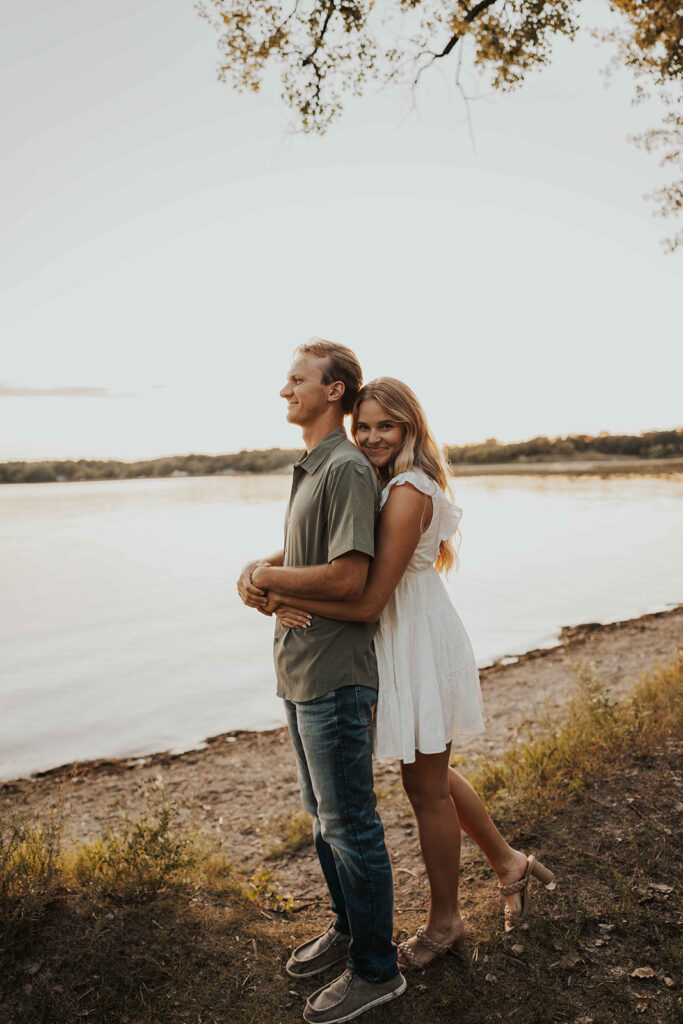 playful and romantic waterfront engagement photos in sibley state park, mn