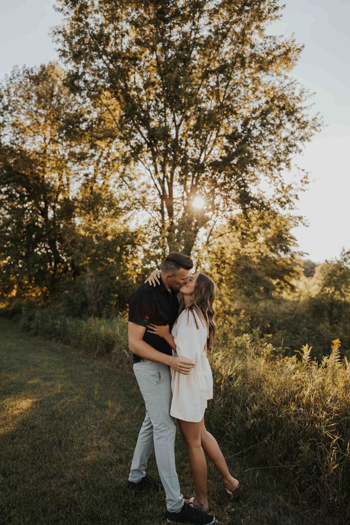 romantic field engagement session at Blue Mounds State Park MN