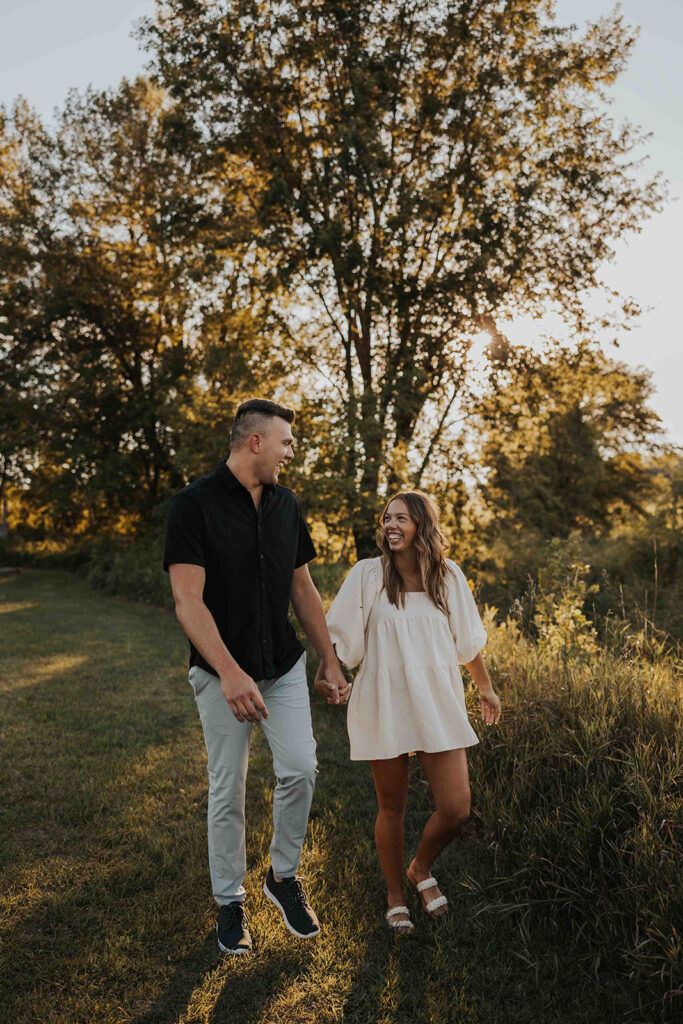 romantic field engagement session at Blue Mounds State Park MN