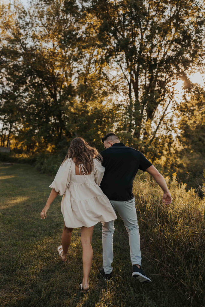 romantic field engagement session at Blue Mounds State Park MN