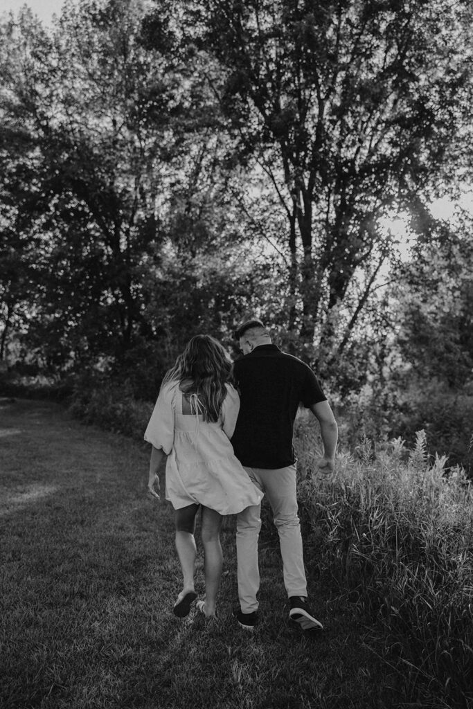 candid, playful and romantic couple at the Blue Mounds State Park