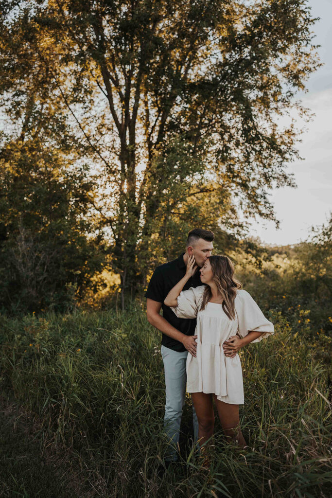 candid, playful and romantic couple at the Blue Mounds State Park