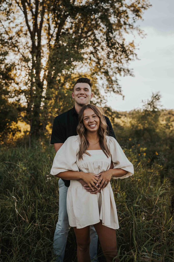 romantic field engagement session at Blue Mounds State Park MN