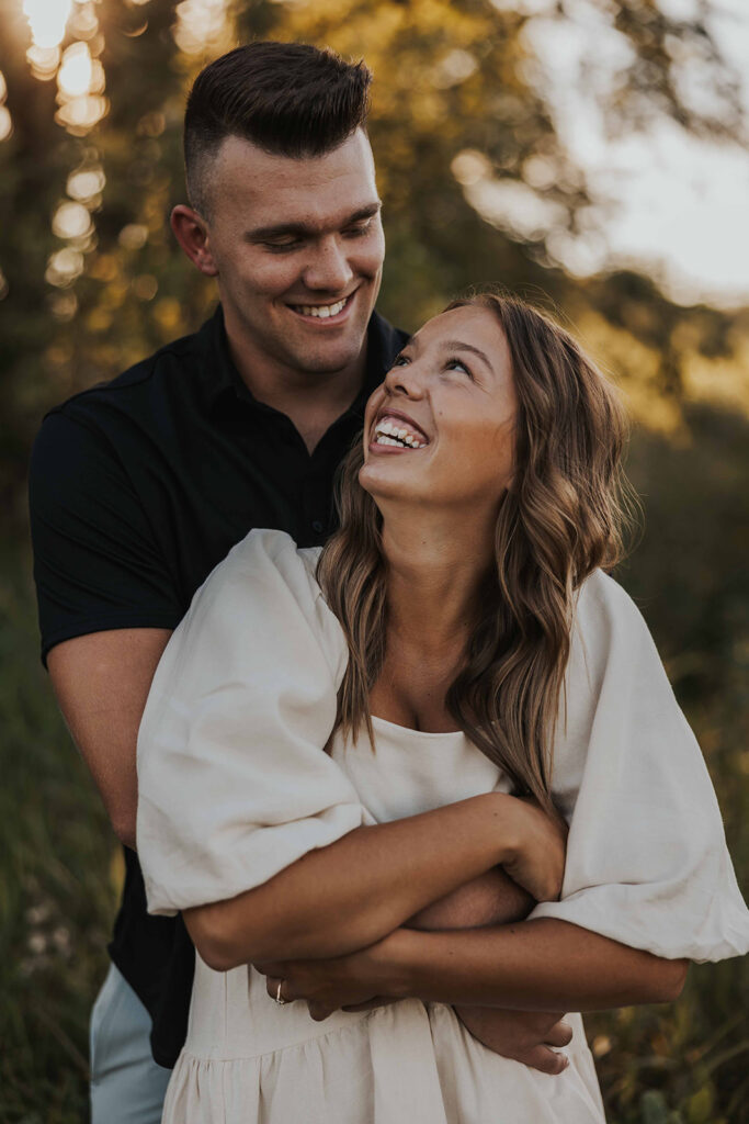 romantic field engagement session at Blue Mounds State Park MN