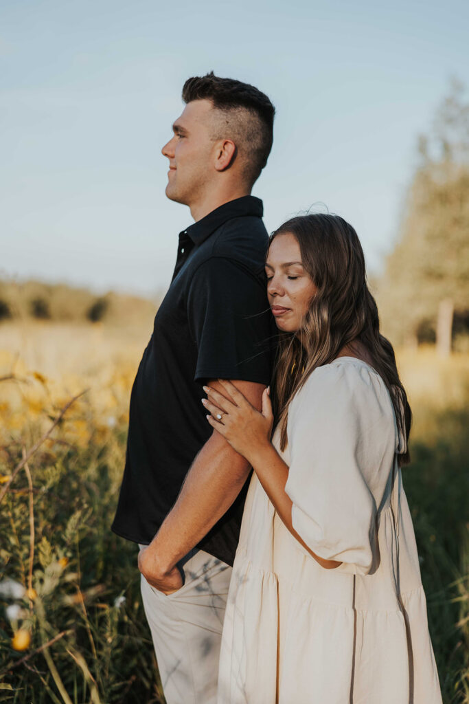 candid and romantic future bride and groom celebrating their love at their engagement photo location