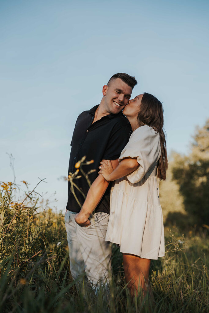 candid, playful and romantic couple at the Blue Mounds State Park