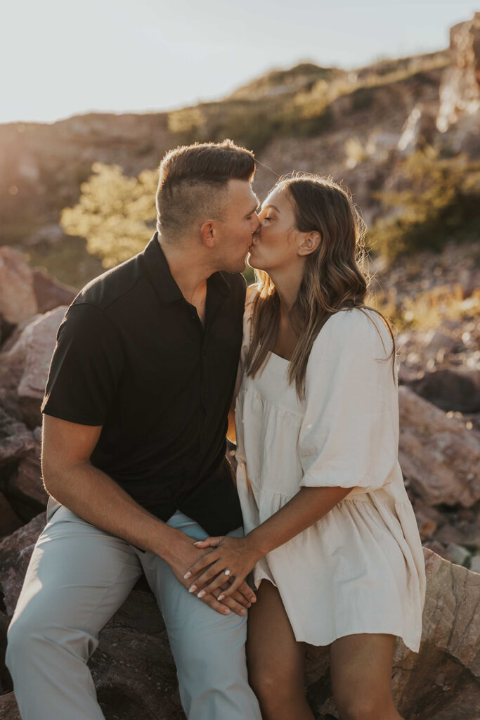 candid and romantic future bride and groom celebrating their love at their engagement photo location