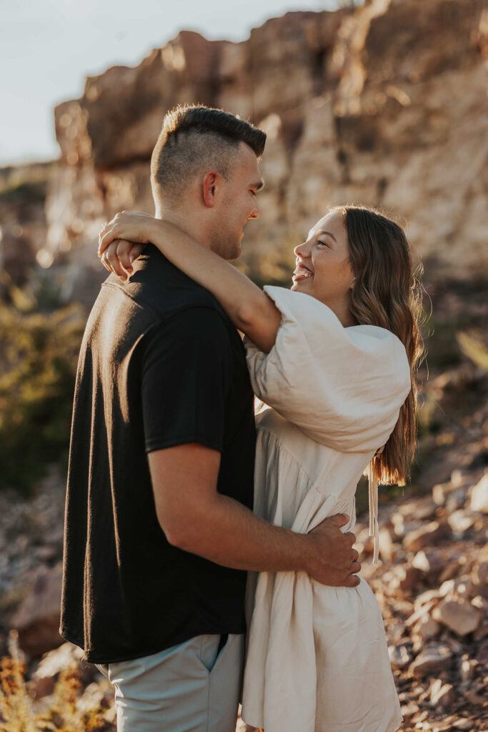 candid, playful and romantic couple at the Blue Mounds State Park