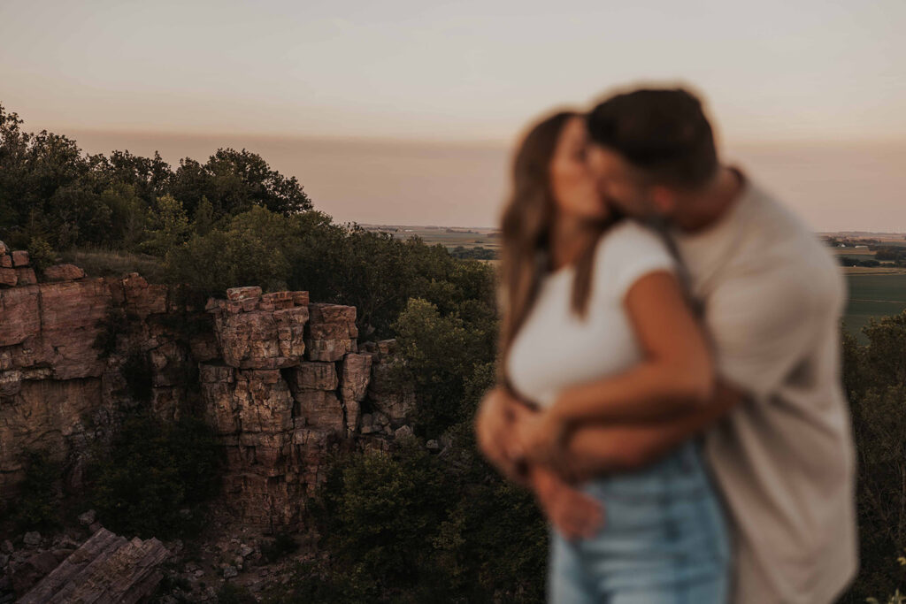 candid, playful and romantic couple at the Blue Mounds State Park