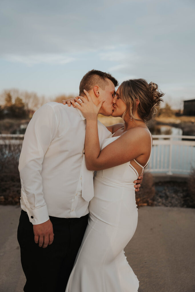 bride and groom sharing a kiss 