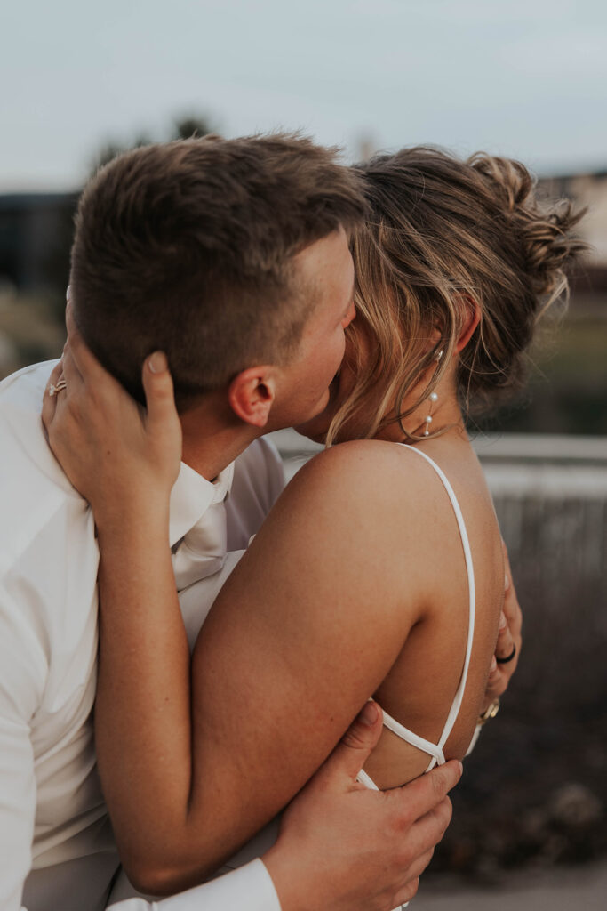 bride and groom sharing a kiss 