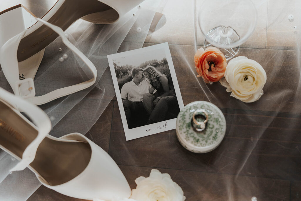 elegant spring wedding detail flatlay showcasing their wedding vendors work