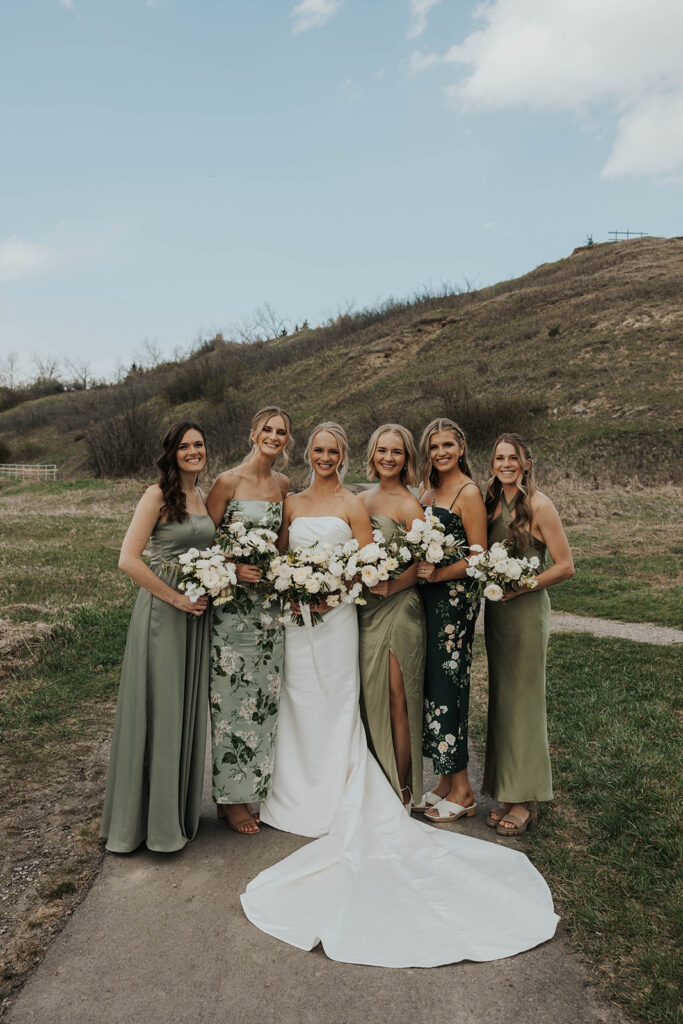 bride and bridesmaid portraits, bridesmaids wearing mismatched olive green bridesmaid dresses