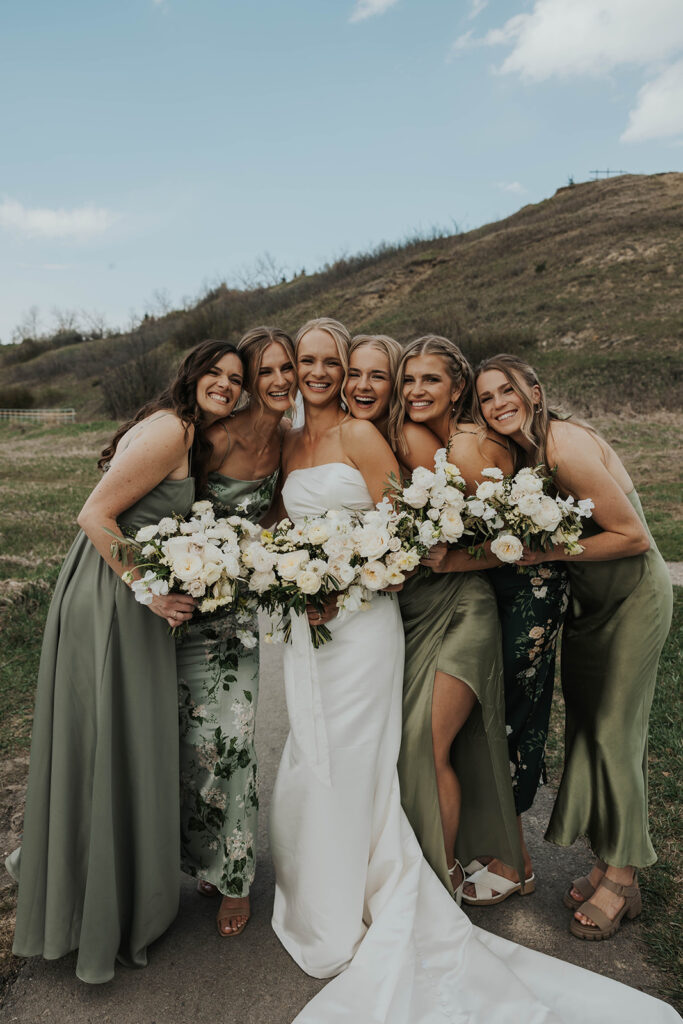 bride and bridesmaid portraits, bridesmaids wearing mismatched olive green bridesmaid dresses