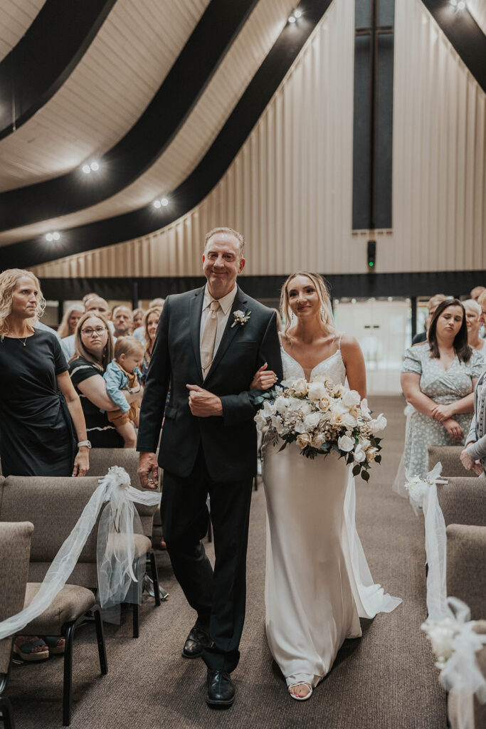 dad walking bride down the aisle