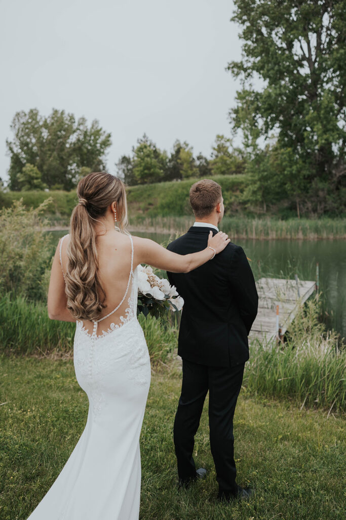 emotional bride and groom wedding first look