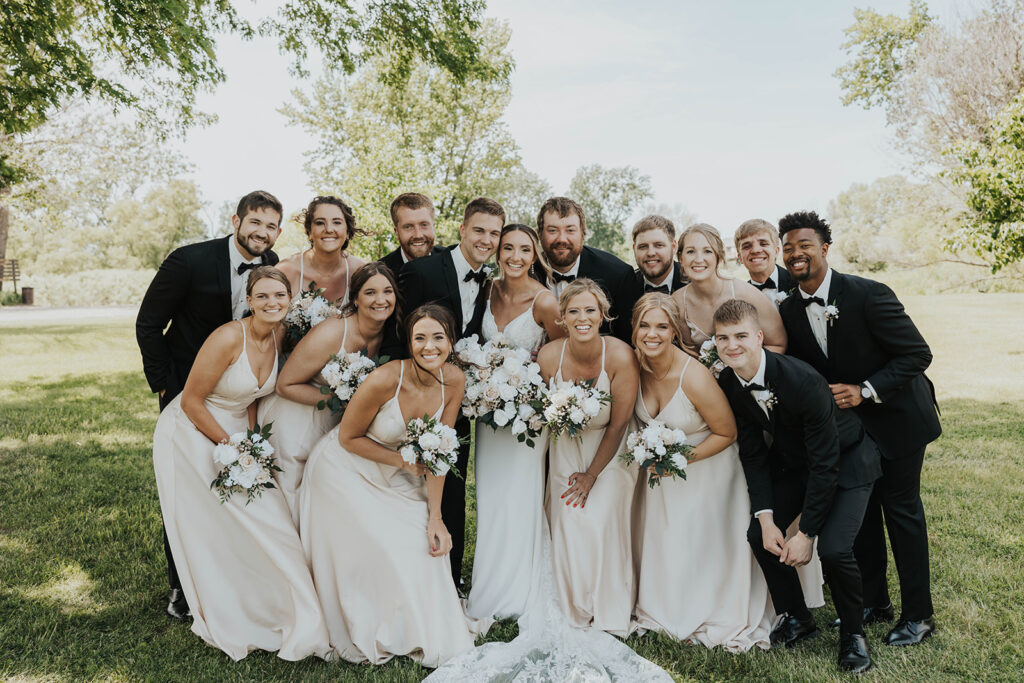 bride and groom surrounded by their bridal party