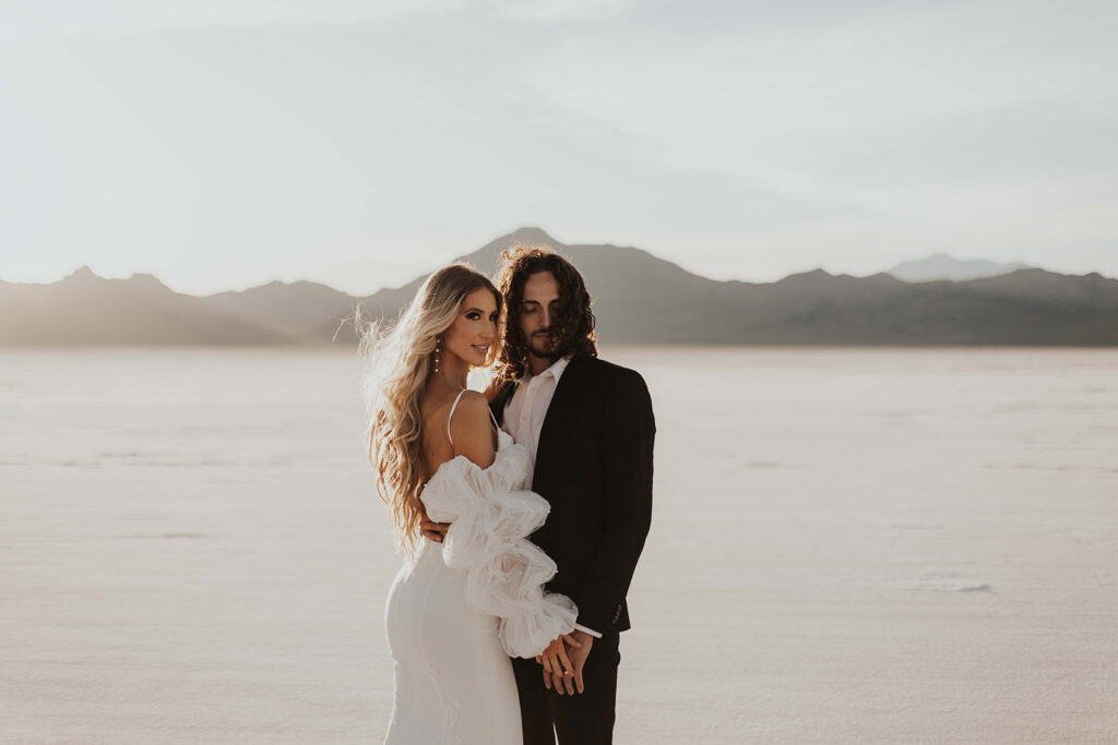 bride and groom at the salt flats for their destination elopement wedding