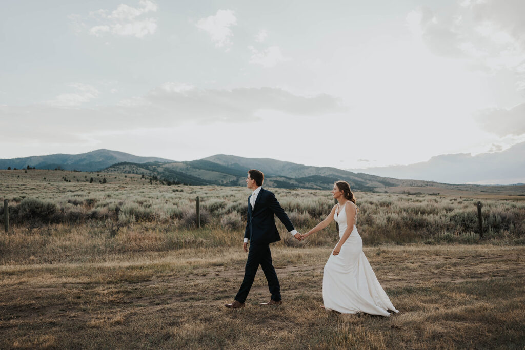 beautiful bride and groom destination elopement wedding photos with a mountain view in Montana