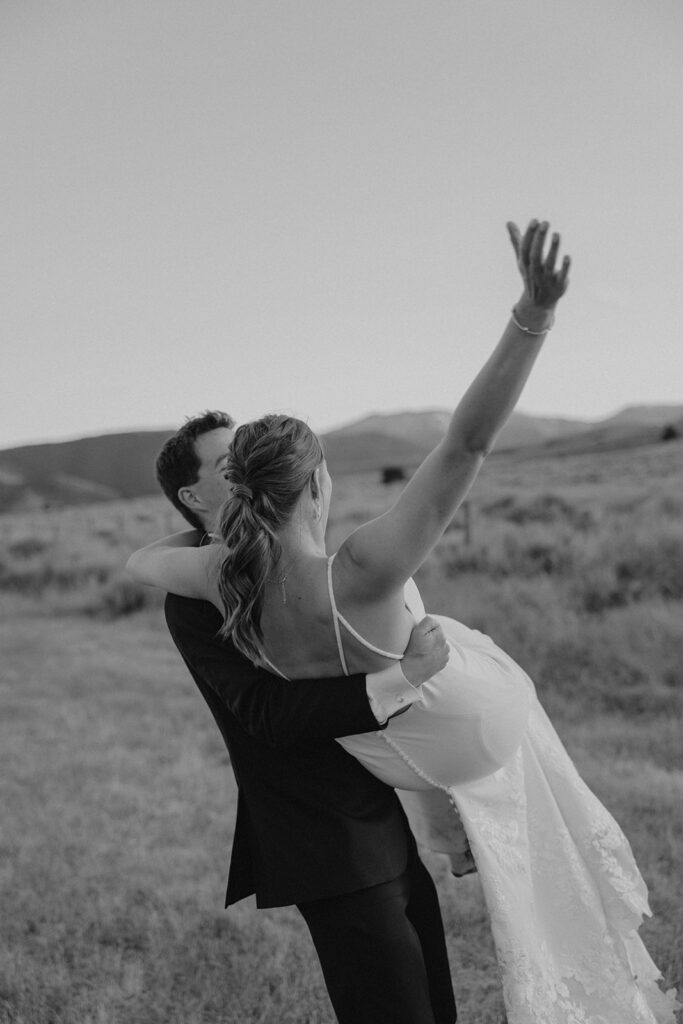 bride and groom roaming around some of the beautiful Montana wedding locations