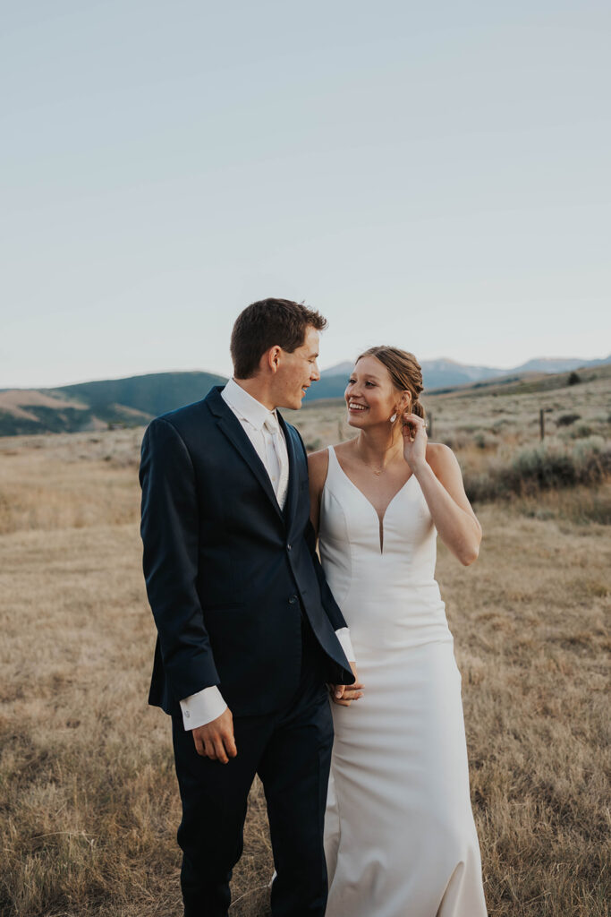 bride and groom roaming around some of the beautiful Montana wedding locations