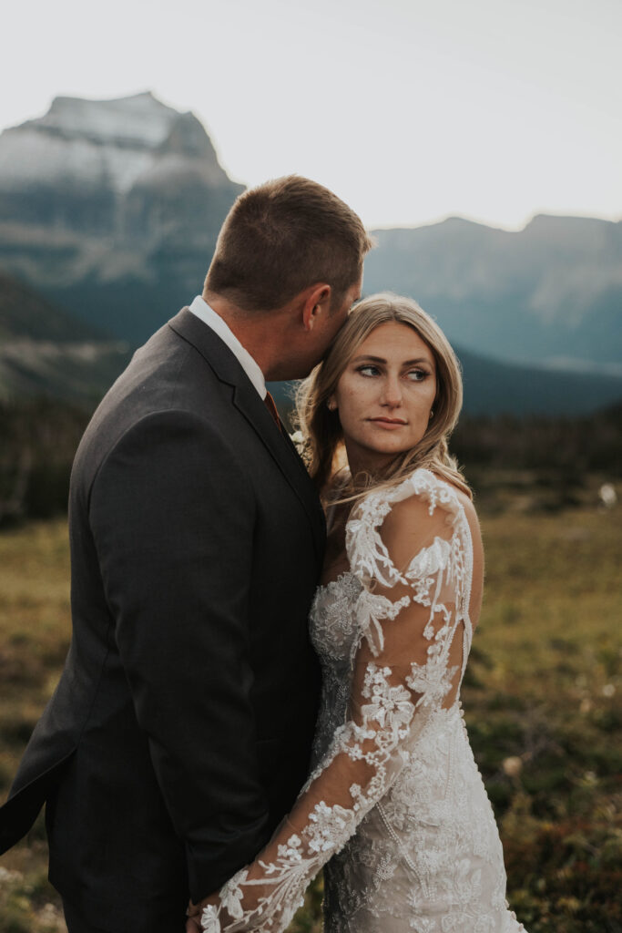 Couple in front of mountain view in Glacier National Park