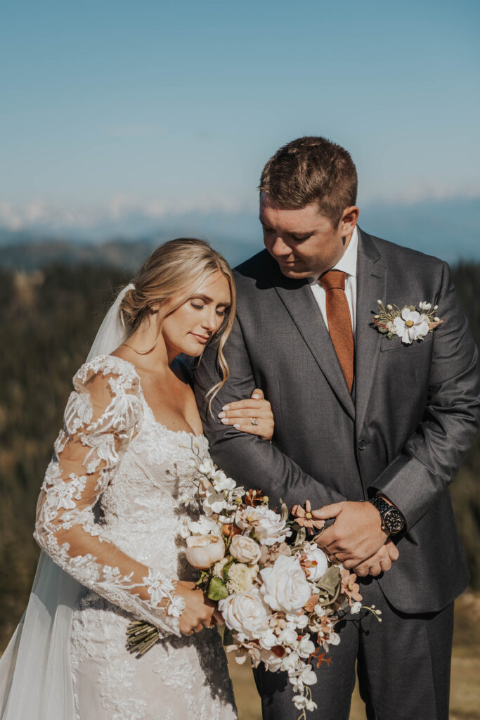 Couple with a bouquet at Whitefish Mountain Resort