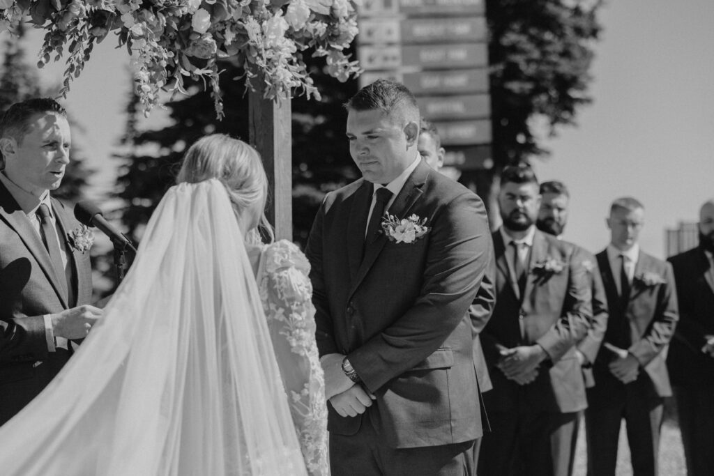 A couple having an elegant wedding ceremony at an altar