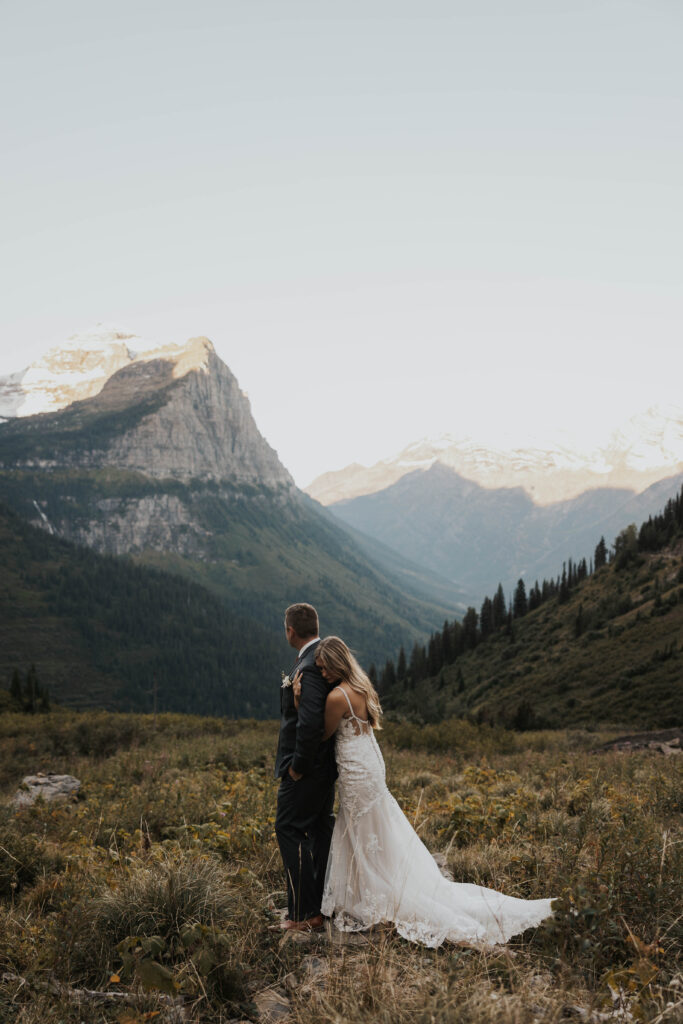 Romantic couple in front of mountains in Glacier National Park