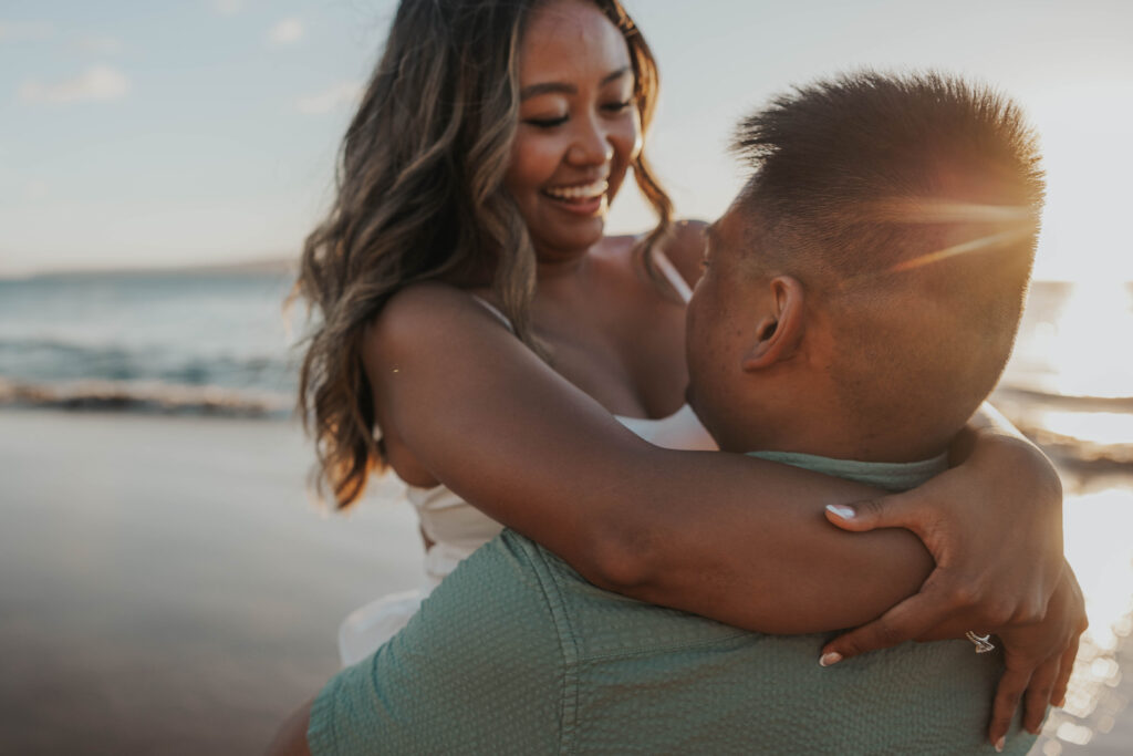 Romantic couple on Po'olenalena Beach in Hawaii.