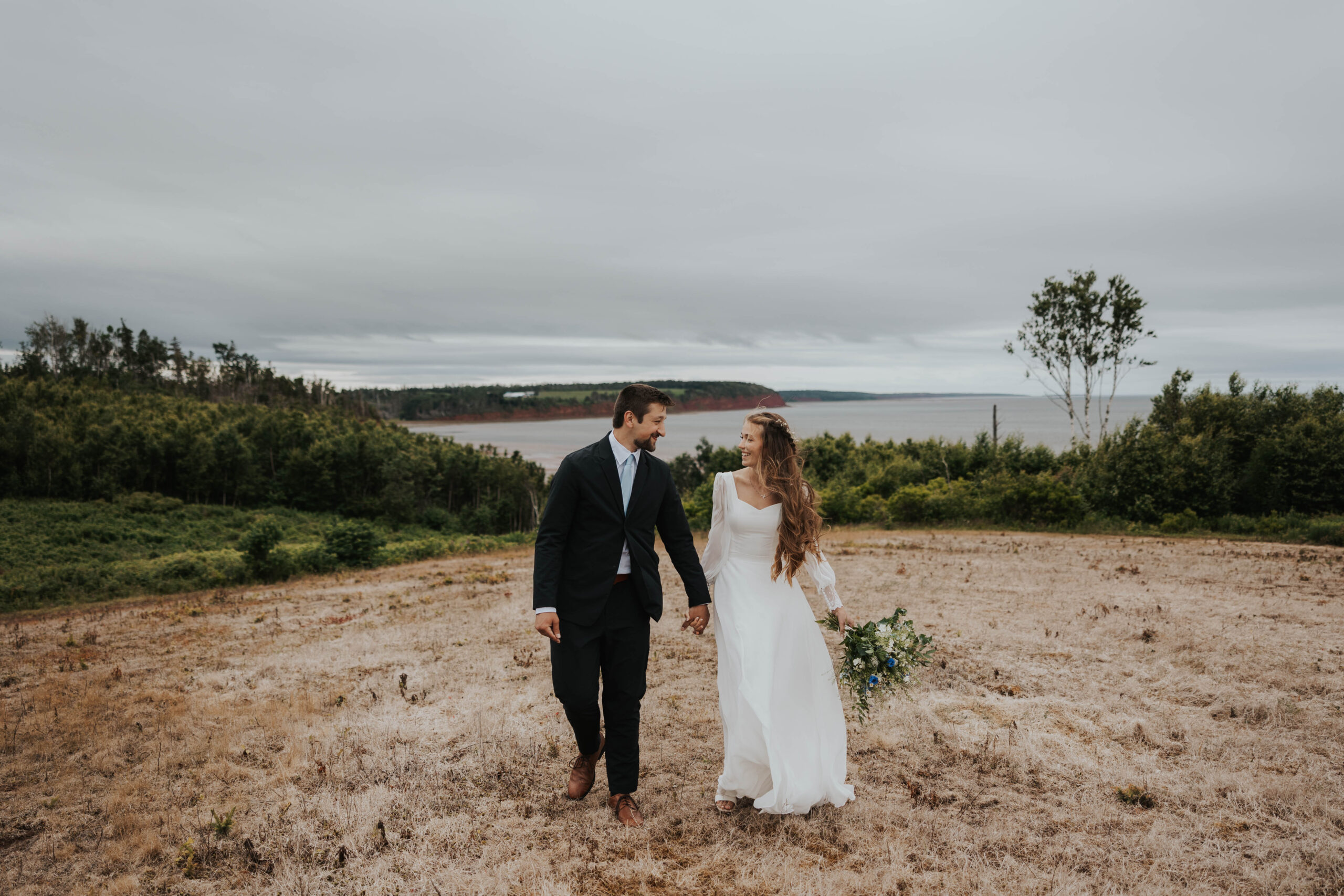 Couple celebrating their destination wedding at Prince Edward Island, Canada