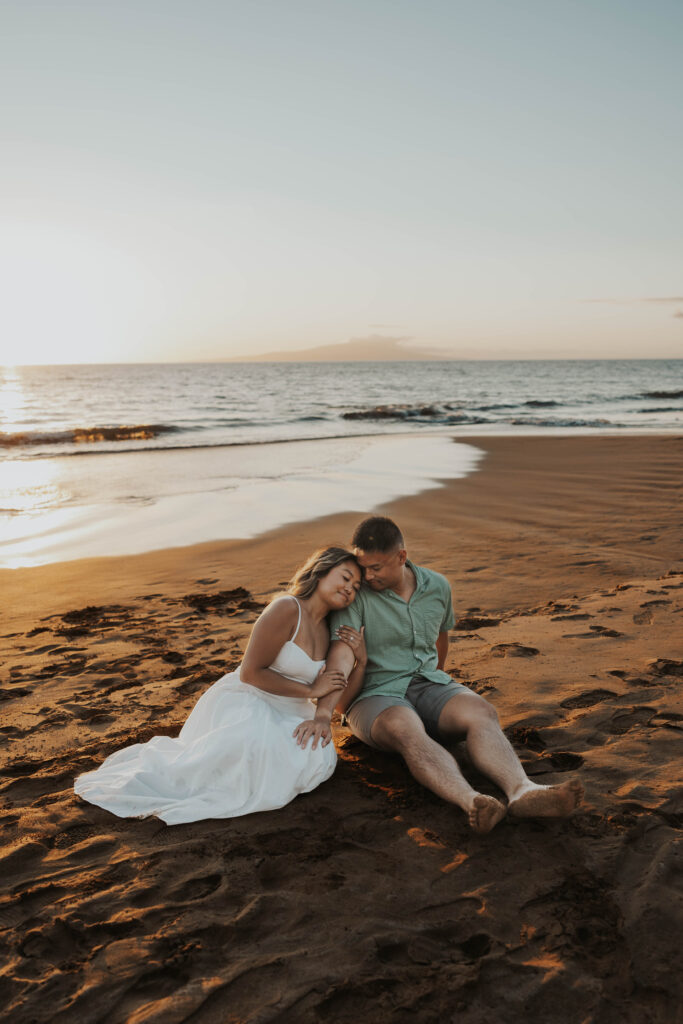 Beach couples photoshoot on Po'olenalena Beach, Maui.