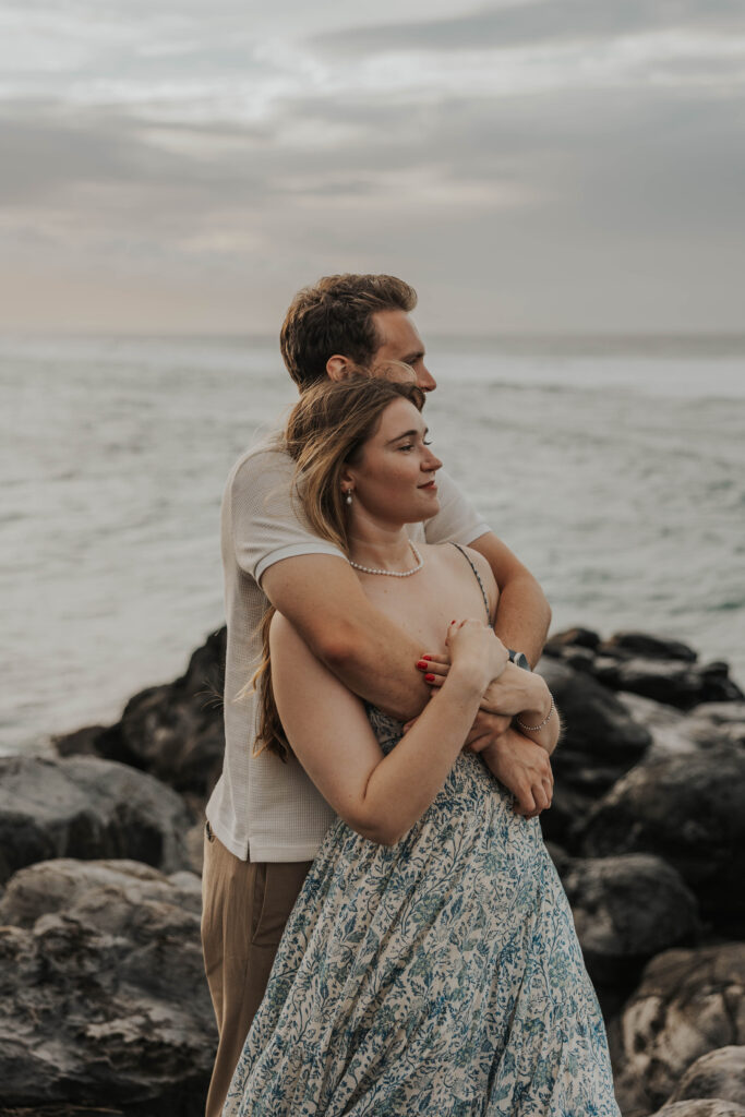 Couple enjoying beach views in Maui, Hawaii