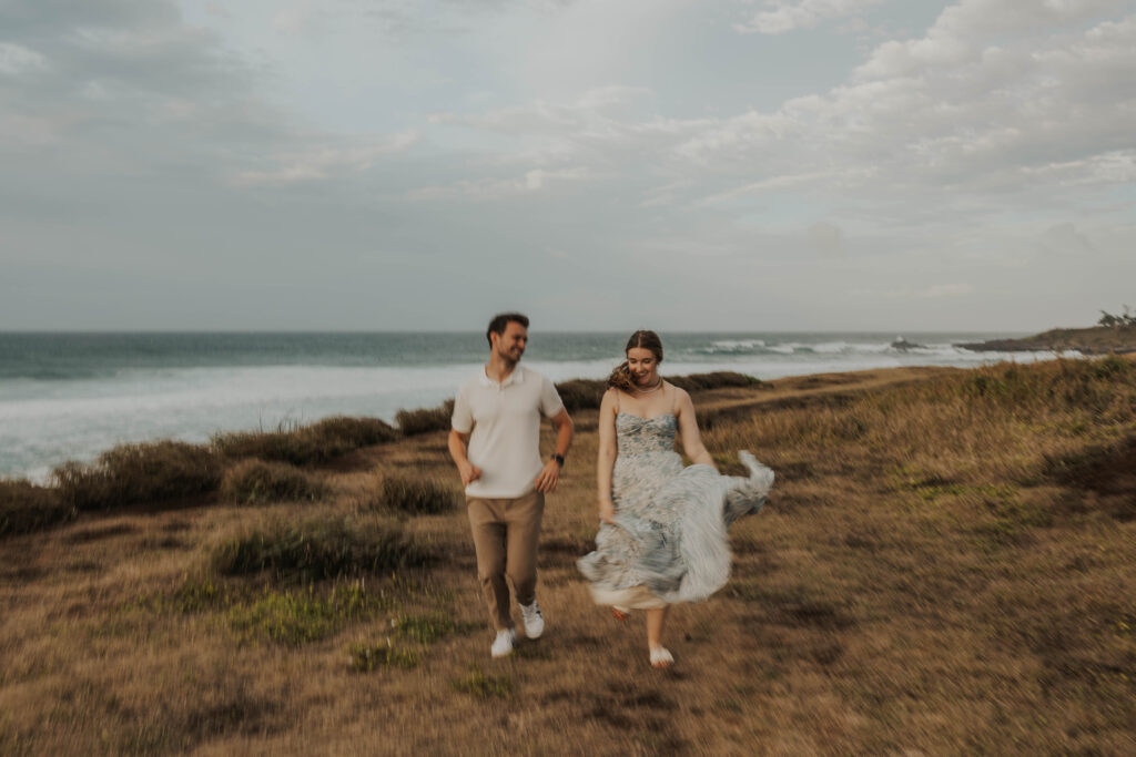 Couple running together on a Maui beach