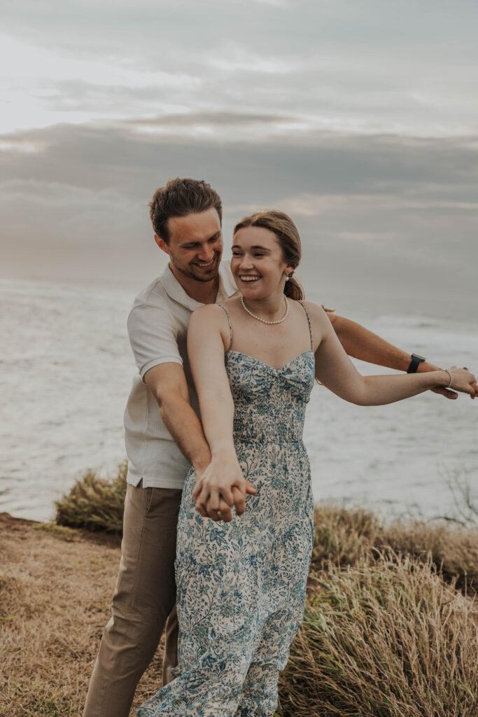 Beach engagement photoshoot on Ho'okipa Beach in Maui, Hawaii 