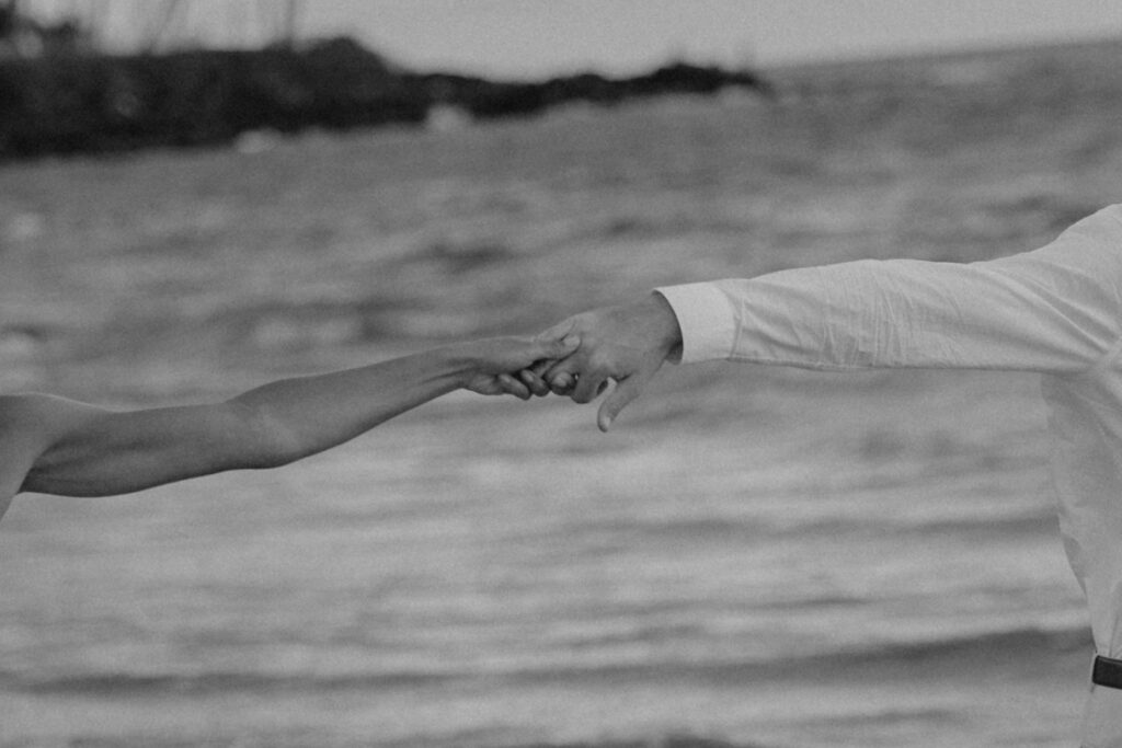 Couple holding hands ready to elope in Maui, Hawaii