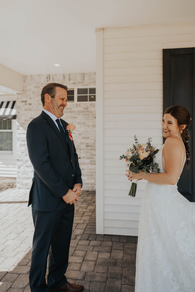 Dad and bride doing a first look