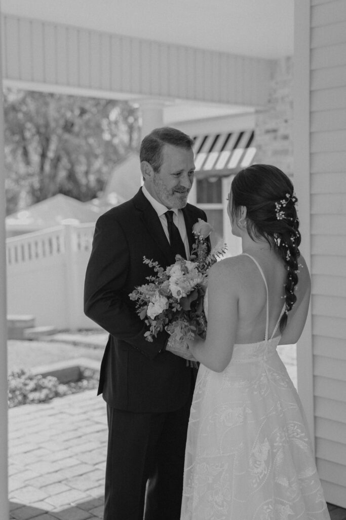 Dad and bride doing a first look