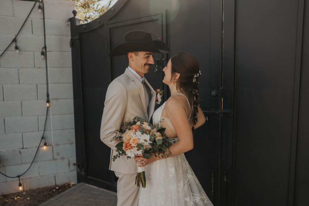 Couple looking at each other at a backyard wedding