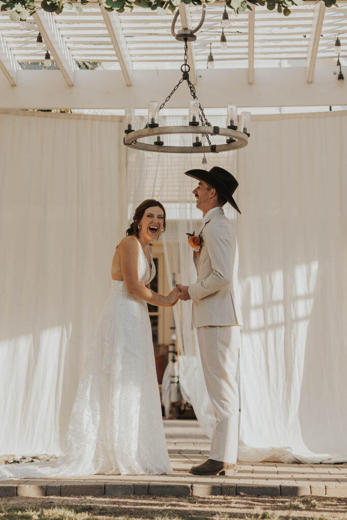 Bride and groom at their backyard wedding ceremony