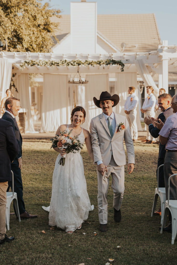 Bride and groom at their backyard wedding ceremony