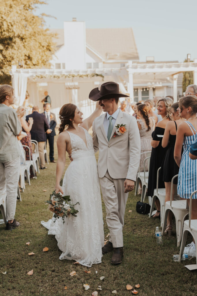 Bride and groom at their backyard wedding ceremony