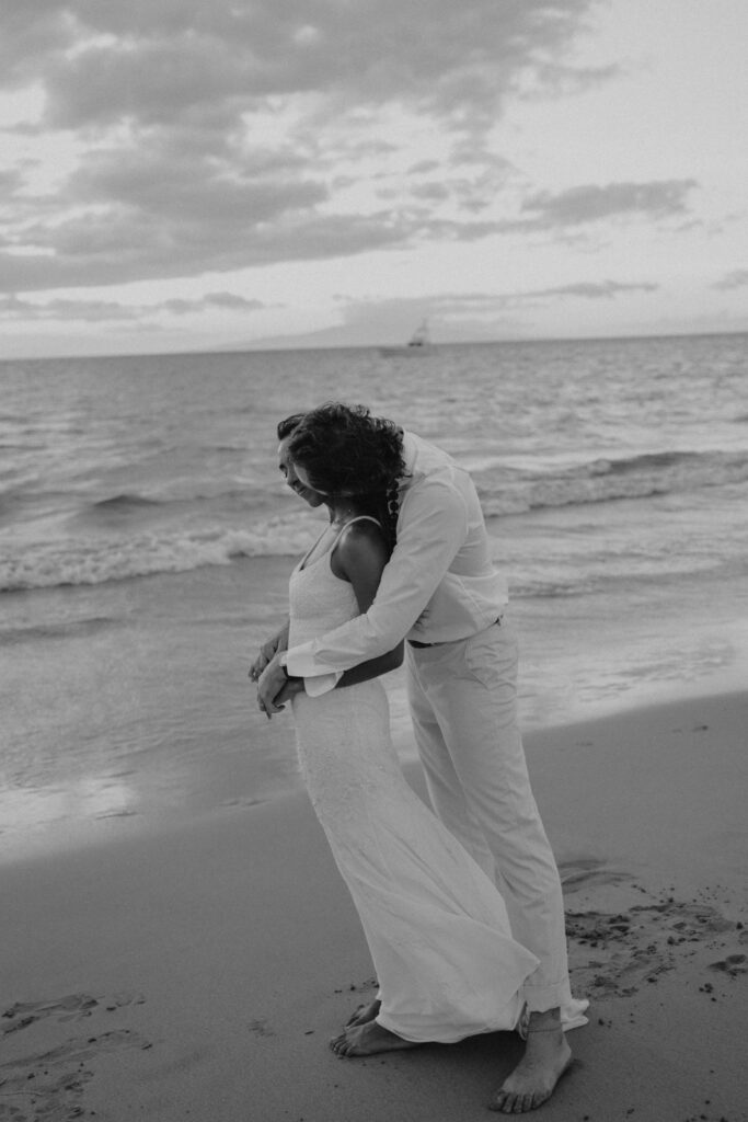 Bride and groom eloping on a Maui beach